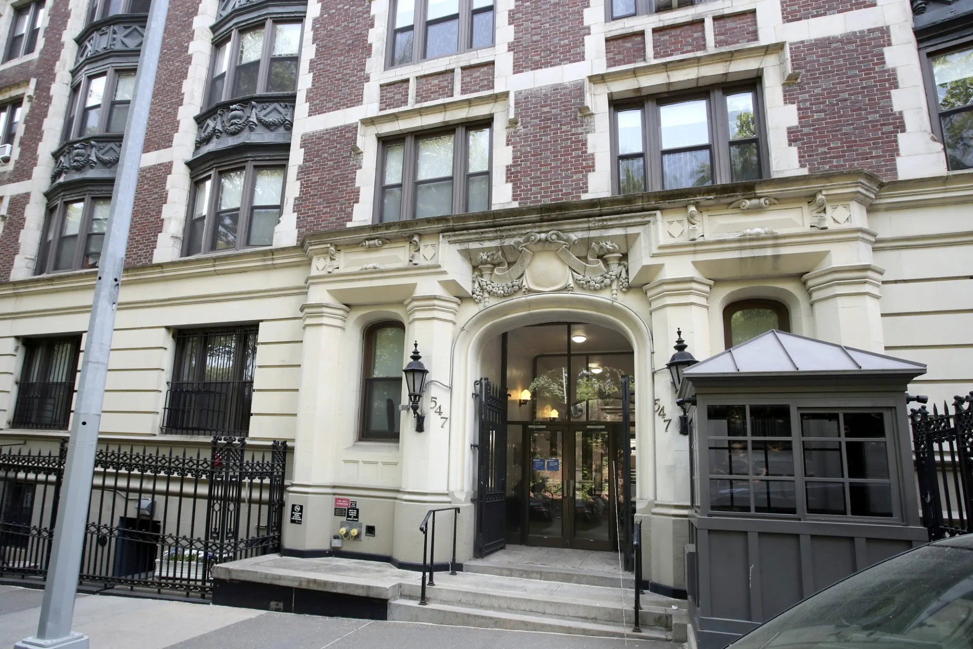 The exterior of 567 Riverside Drive, a brick apartment building