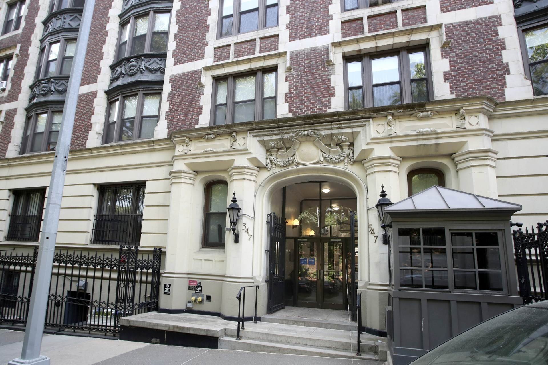 The exterior of 567 Riverside Drive, a brick apartment building.